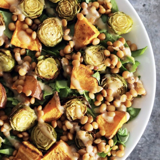 Roasted Kumara and Brussel Sprouts with Maple Tahini Drizzle recipe